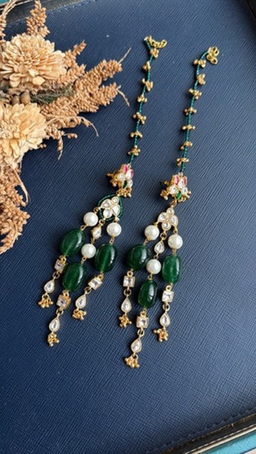 Madhuri Kundan dangler earrings with sahara ear chain, emerald green and pearl drops in gold tone