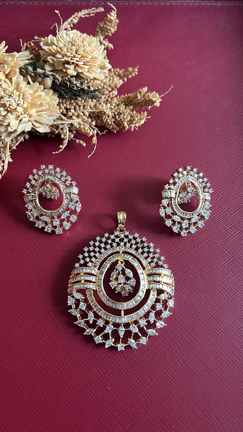 Gold-tone American Diamond pendant set from Hema Collections