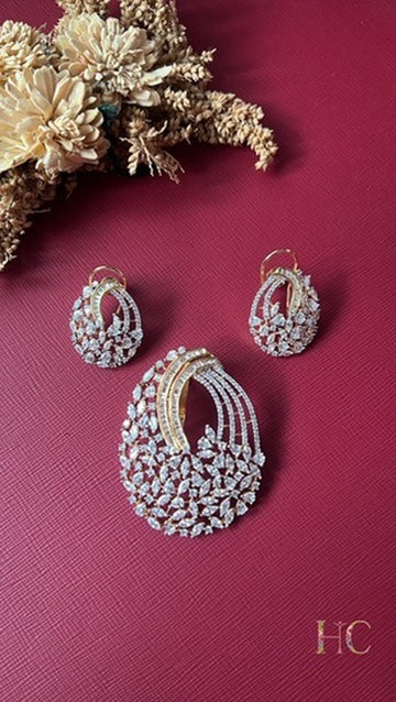 Gold-tone American Diamond pendant set from Hema Collections