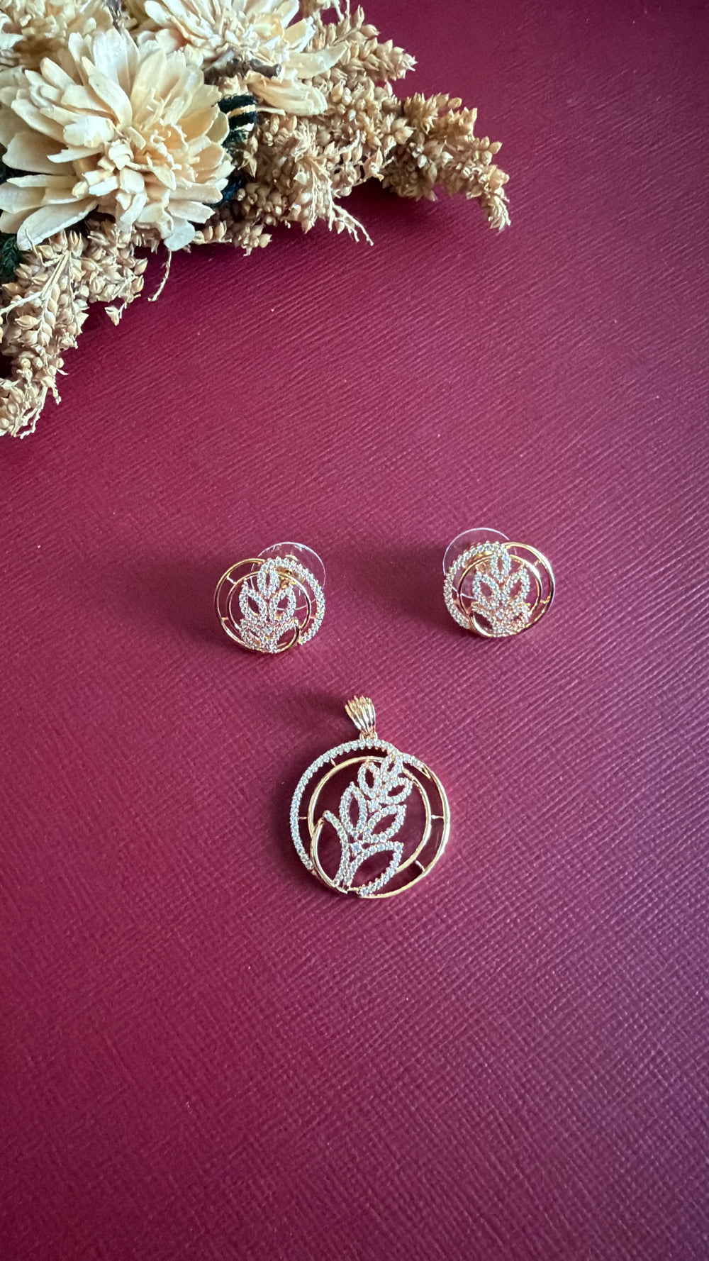 Gold-tone American Diamond pendant set from Hema Collections