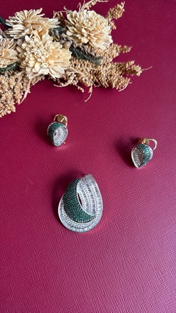 Gold-tone green American Diamond pendant set from Hema Collections