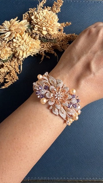 Rushika rose gold fusion bracelet with pearls, purple stones and AAA CZ floral centrepiece