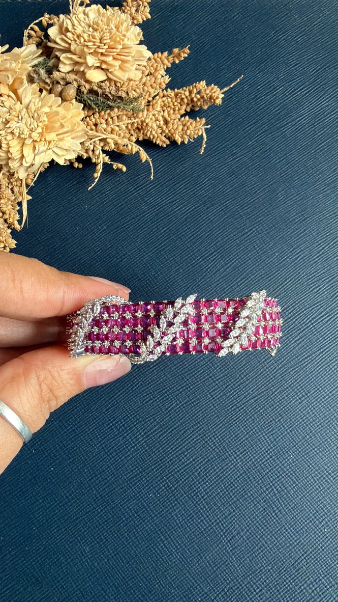 Ruby cushion-cut stones and white CZ on silver-tone bracelet